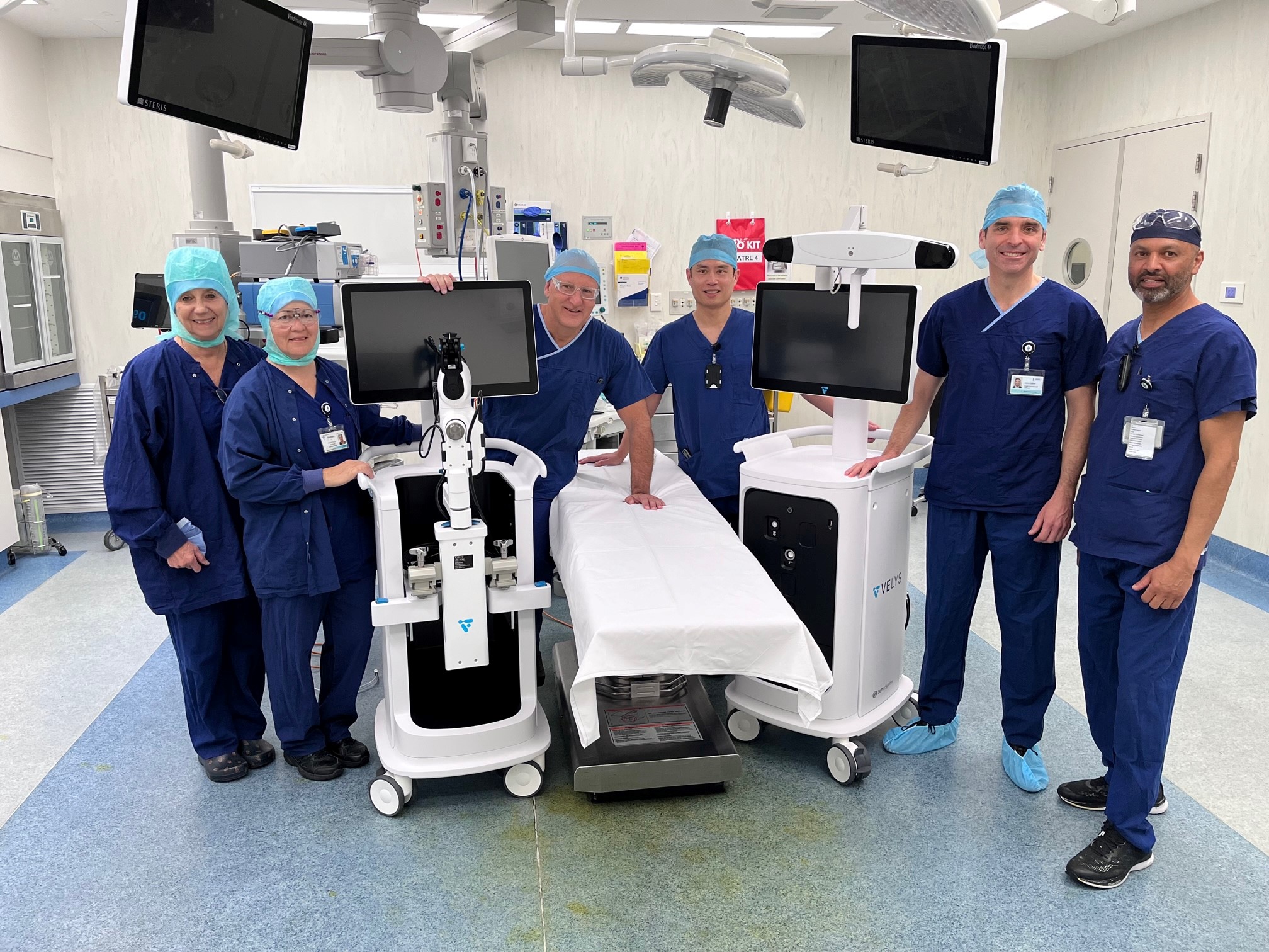 San staff and doctors with the new Velys Orthopaedic Surgical Robot